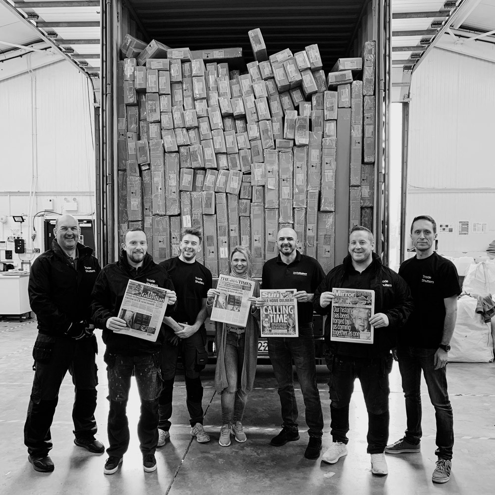Trade Shutters team receiving containers